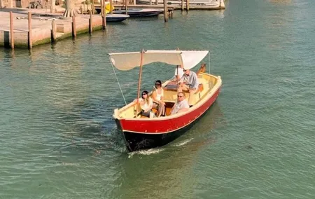 Sunset in a typical boat in Venice