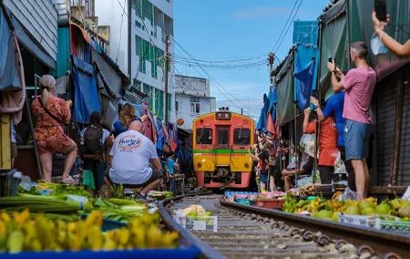 Damnoen Saduak Floating Market and Maeklong Railway Market Tour
