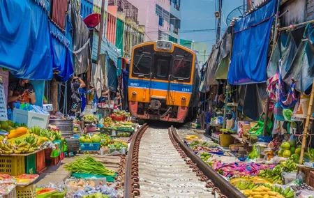 Damnoen Saduak Floating Market & Railway Market Tour from Bangkok