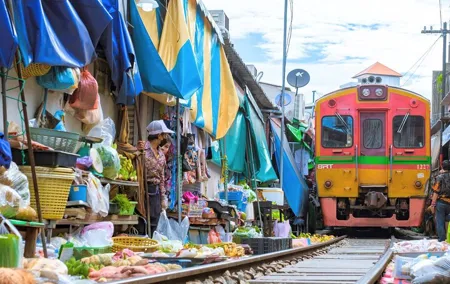 Amphawa Floating Market & Maeklong Railway Train Market Tour
