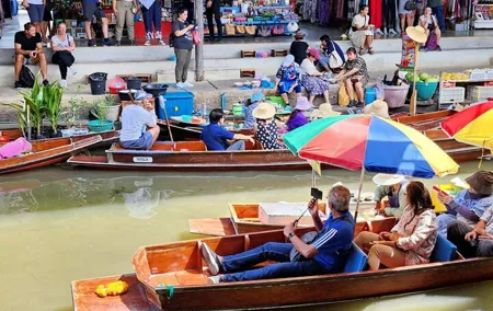 Maeklong Railway and Damnoen Saduak Floating Market Tour