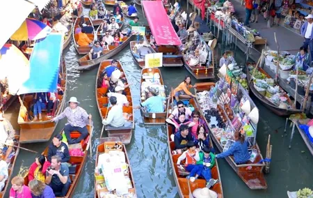 Explore Thailand’s Floating Market with Paddle Boat Adventure
