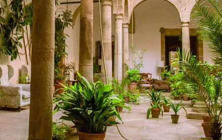 2-Day guided tour Caceres & Sevilla from Madrid by Bus and High Speed Train