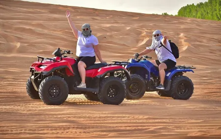 Dubai Desert Safari: Quad Bike, Sandboard, Camel Ride and BBQ