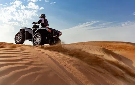 Dubai Desert Safari with Quad Bike, Camel Ride, Dinner and Shows