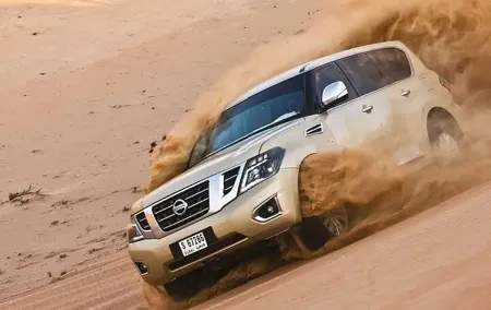 Evening Desert Safari Dubai: Red Dunes, Camel Ride & BBQ Dinner