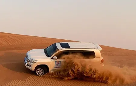 Dubai Morning Desert Safari: Camel Ride & Sandboarding!