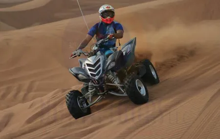 Dune Bashing with Quad Bike and Sand Boarding from Dubai