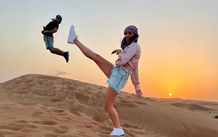 Desert Safari BBQ dinner, Camel ride & sandboarding from Dubai