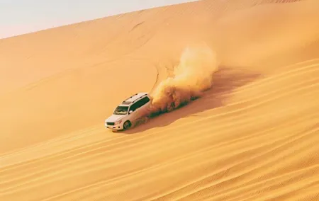 Dubai Half Day Desert Safari With Camel Ride and Quad Bike Option