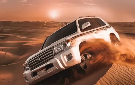 Red Dune Desert Safari Tour with Camel Ride & BBQ Experience