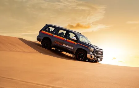 Dubai Desert Safari - Camel Ride, Sandboarding & Quad Bike