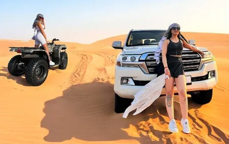 Desert Safari Dubai Tour with Dune Bashing, Camel Ride, & BBQ