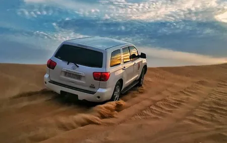 Sunset Desert Safari Dubai with Camel Ride and Sandboarding