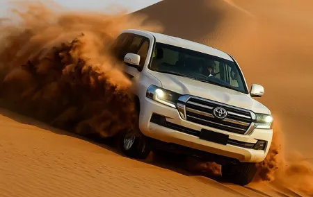 VIP Red Dune Desert Safari with Quad Bike Dune Bashing Camel Ride