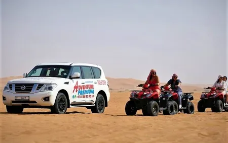 Dubai Desert Safari with Quad Bike, Dune Bashing, Camel Ride, Sand Boarding &BBQ