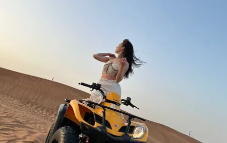 Dubai Desert Safari with Quad Bike, sandboarding, live show & BBQ