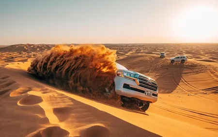 Morning Red Dunes Safari: Camel Ride & Sandboarding Adventure