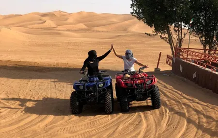 Dubai: Unique SUNSET Quad Bike Red Dunes Safari