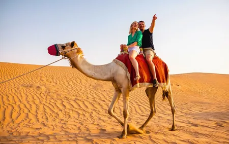 Sunset Desert Adventure with Quad Biking, BBQ, and Live Shows