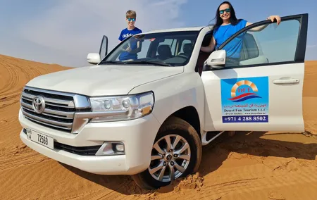 Early Morning Desert Safari Camel Ride, Sandboarding Falcon Photo