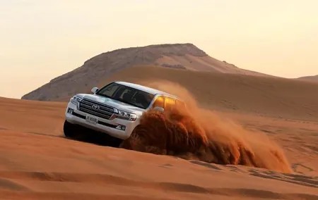 Morning Desert Safari in Dubai with Camel Ride and Sandboarding