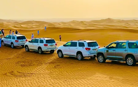 Afternoon Desert Safari with Quad Bike, Camel Ride and Sandboarding