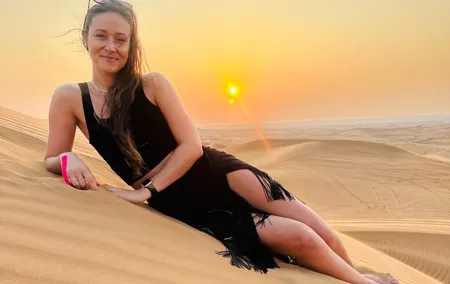 Sunset Desert safari with Camel Ride Sand Board & BBQ Dinner