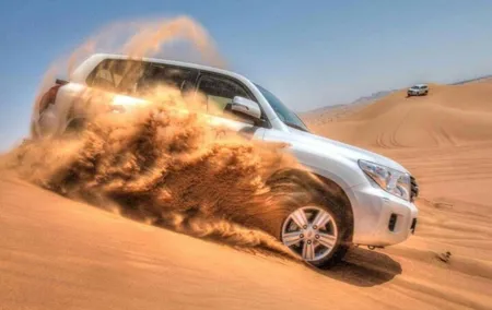 Dubai Desert Safari with Camel Riding, Sand Boarding,BBQ Dinner and 3 Live Shows