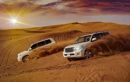 Evening Desert Safari with Camel Ride, BBQ Dinner and Dune Bashing