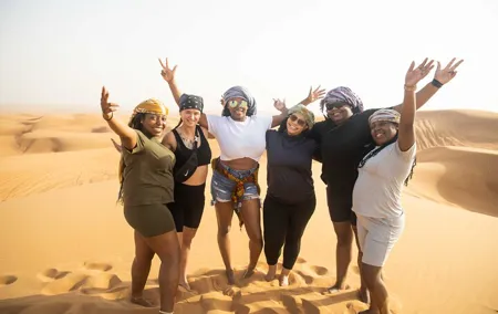 Dubai Half-day Red Dunes bashing with Sandboarding, Camel &Falcon
