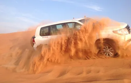 Dubai Desert Safari by Camel and 4x4 Jeep with BBQ Dinner with Live Belly Dance