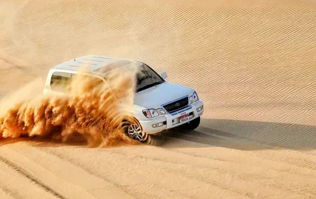 Red Dunes , Sandboarding, Camel Ride & BBQ at Al Khayma Camp