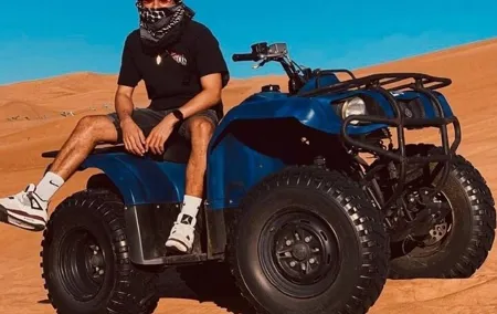 Desert Safari Dubai 25 minutes Quad Bike Free Camel Ride BBQ Dinner