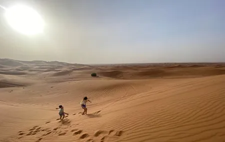 Morning Desert Safari with Dune Bashing, Camel Ride, Sand Board & Quad Biking