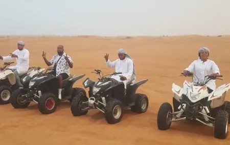 Quad Bike Dubai Desert Safari with BBQ Dinner Sandboard and Show
