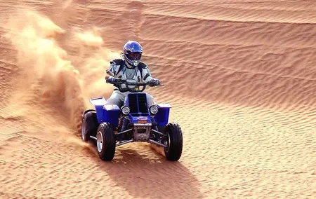 Dubai Morning Desert Safari with Quad Bike, Camel & Dune Bashing