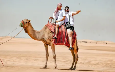Dubai Morning Desert Safari Quad bike Ride Camel ride sandboard