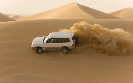 Morning Desert Safari plus Quad Bike, Sandboard and Camel ride
