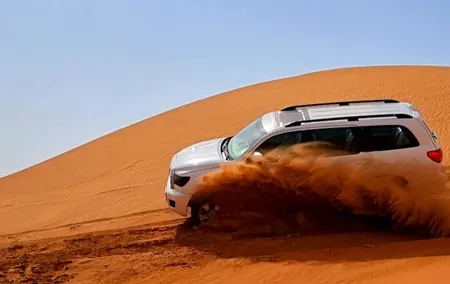 Professional Desert Safari with Camel Ride & BBQ in Bedouin Camp