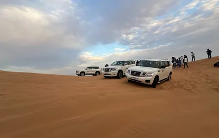 Morning Red Dune Desert Safari Camel Ride and Sandboarding