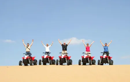 Dubai Red Dunes Safari by Quad Bike, Sand boarding, Camel Ride & BBQ Dinner
