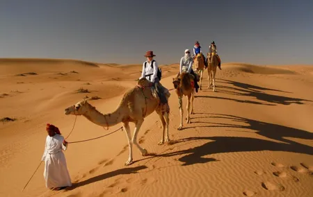 Camel Trekking Dubai with Morning Dune Bashing and Sand Boarding