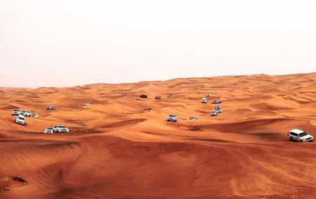Dubai Desert Safari Red Dune: BBQ, Camel Ride & Sandboarding