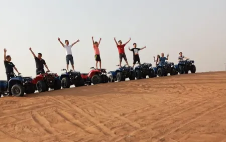 Evening Safari with Quad Bike, Camel Riding, BBQ Dinner and Dune Bashing