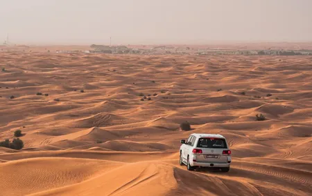 Private Morning Safari with Camel Ride and Sand boarding