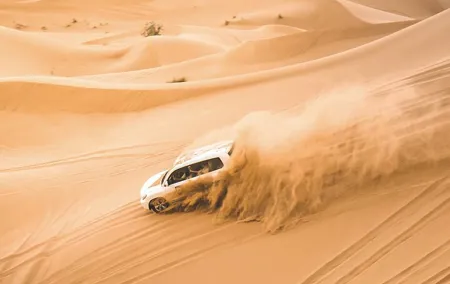 Dubai: Morning Desert Safari with Camel Ride & Sandboarding