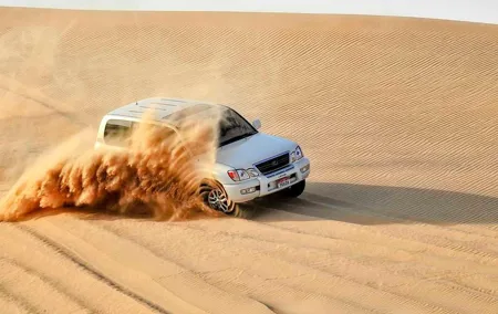 The Best Dubai Desert Safari with Quad Biking & Dune Bashing & BBQ & Live Show