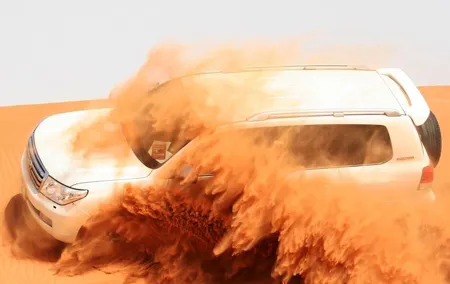 Morning Dubai Desert Safari with Sand boarding and Camel Ride