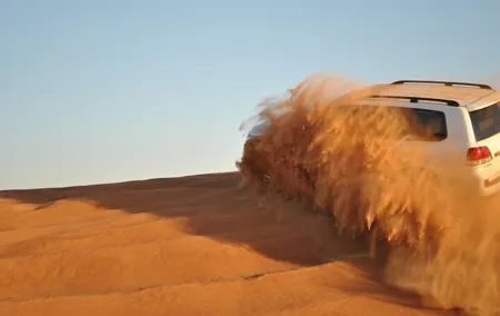 Evening Desert Safari Tour with Sand Surfing, BBQ Dinner (Exclusive Car)